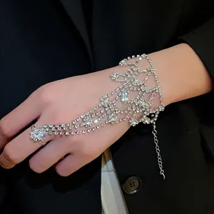 Elegant rhinestone ring-to-wrist slave bracelet perfect for formal prom or gala evening attire