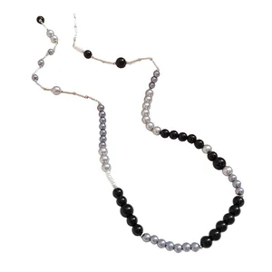 Vintage acrylic pearl necklace with mixed black and silver beads for elegant women