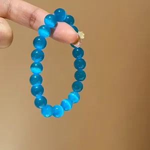 Vibrant blue cat's eye beaded elastic bracelet with shimmering light effect, SKU variant