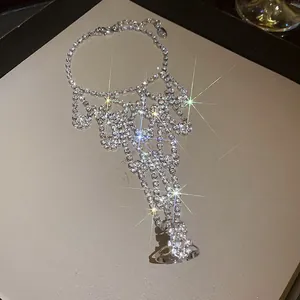 Detailed view of sparkling rhinestone hand chain ring bracelet for elegant evening wear