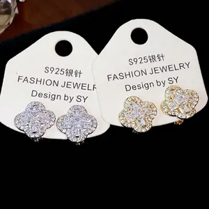 Sparkling zircon four-leaf clover clip-on earrings in gold and silver plating