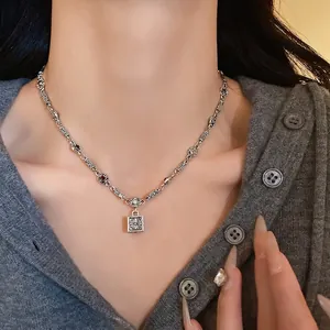 Vintage silver square pendant necklace with intricate engravings for elegant women