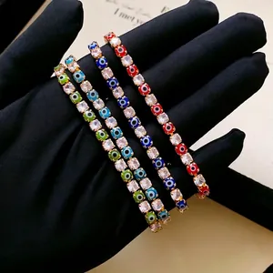 Gold-plated tennis bracelet with square zirconia and colorful evil eye charms