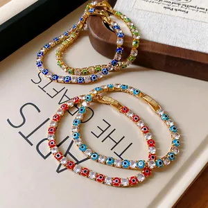 Close-up detail of luxury evil eye tennis bracelets with square sparkling zircons
