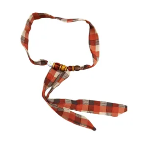 Bohemian plaid fabric necklace with wooden and ceramic beads in ethnic retro style