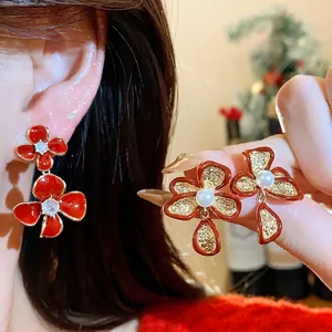Elegant 18k gold plated red flower stud earrings featuring sparkling zircon and pearls