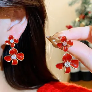 Elegant red enamel flower drop earrings with sparkling zircon centers and 18k gold plating