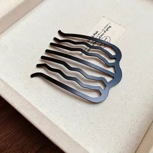 Minimalist black U-shaped wavy metal hair comb for elegant summer bun hairstyles