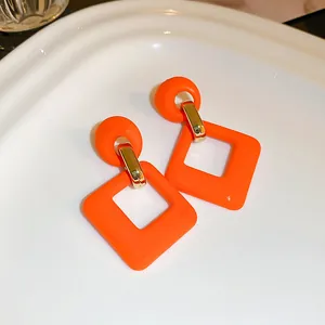 Elegant retro vibrant orange geometric square drop earrings with gold tone metallic links