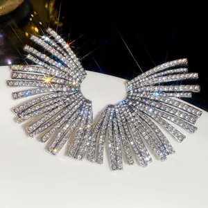 Sparkling rhinestone fan-shaped stud earrings in silver finish for luxury evening wear