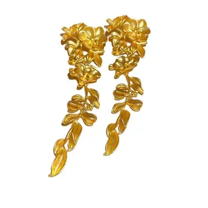 Elegant golden floral tassel drop earrings with hypoallergenic silver needle posts