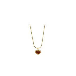 Elegant gold-toned heart pendant necklace with red enamel oil drop finish for women