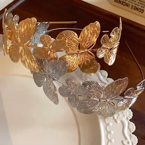 Eleganti cerchietti in metallo con farfalle in oro e argento per acconciature alte