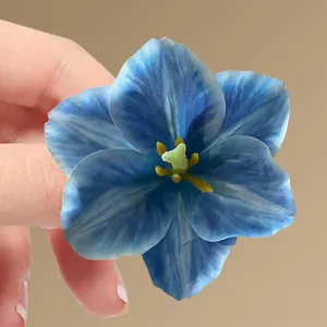 Blue 3D simulation flower hair clip with fabric petals and yellow stamen for women accessory