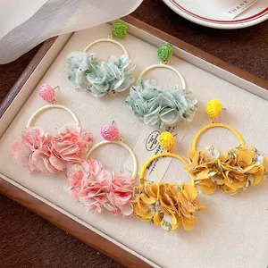 Bohemian sweet fabric flower petal hoop earrings in pink, yellow, and green colors