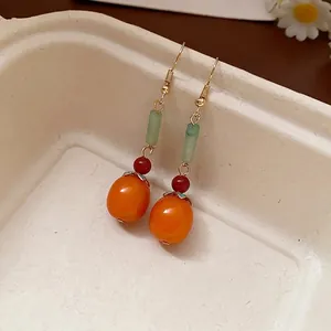 Vintage Chinese style persimmon resin drop earrings with green and red bead accents