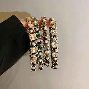 Elegant pearl and rhinestone padded headbands set for a high cranial top hairstyle