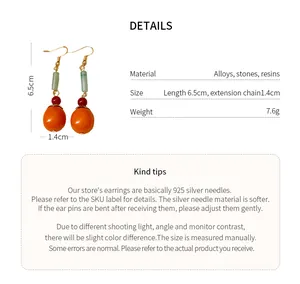 Detail view of New Chinese Style persimmon earrings with dimensions and material info.