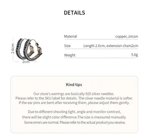 Close-up of geometric zircon hoop earrings showing size and material specifications