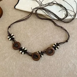 Handmade vintage ethnic style woven waist chain with carved paisley wood and white beads
