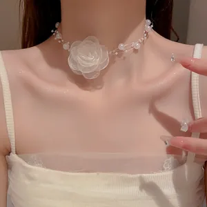 Elegant double-layer pearl choker with a delicate white fabric rose flower pendant.