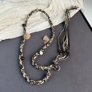 Handmade ethnic style woven waist chain with decorative beads and tassels for women