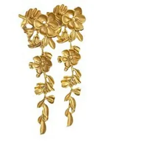 Elegant gold floral drop earrings with pleated metal texture and long tassel hangings