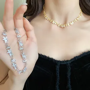 Elegant zirconia choker featuring irregular square stitching in gold and silver