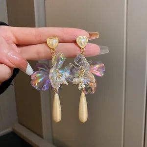Vintage iridescent flower earrings with pearl heart studs and teardrop tassels.