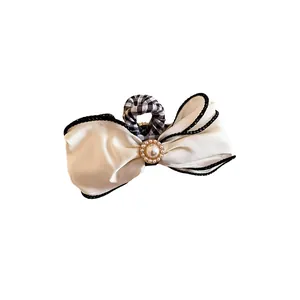 Elegant Korean style fabric bow hair claw clip with pearl decoration and checkered detail