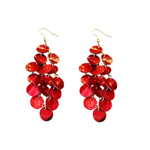 Elegant vibrant red shell tassel drop earrings with gold hooks perfect for beach vacations.