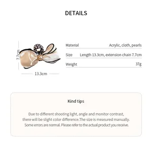 Detail view of Korean style fabric bow hair claw clip with measurements and material info.