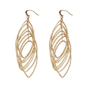 Vintage gold-toned layered oval hollow dangle earrings with textured metal finish