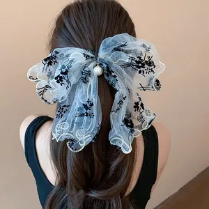 Elegant Korean style mesh fabric bow hair clip with black floral embroidery and pearl