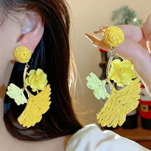 Elegant handmade yellow raffia ginkgo leaf drop earrings for resort fashion style