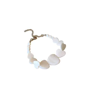 Minimalist irregular heart-shaped shell necklace with adjustable silver lobster clasp chain