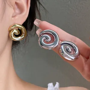 Elegant vintage metallic spiral geometric stud earrings in gold and silver finish for women