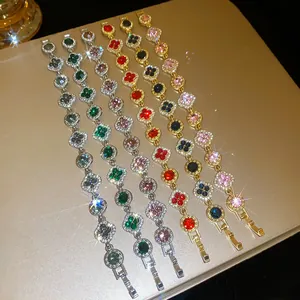 Close-up view of flower-shaped bracelets featuring colorful crystals and gold-plated finishes