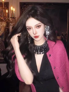 Model wearing exaggerated flower waterdrop tassel earrings with shimmering crystals
