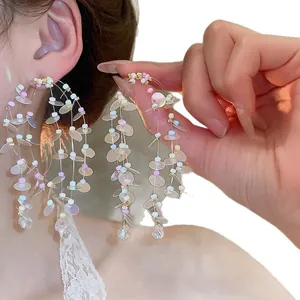 Elegant handmade long tassel earrings with iridescent sequins and beads for vacation style