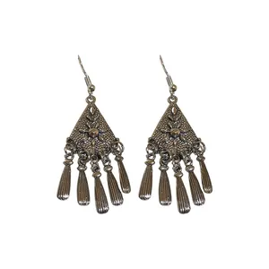 Vintage ethnic style silver flower tassel drop earrings for women on white background