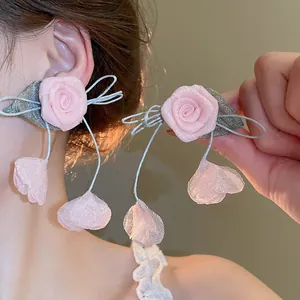 Sweet pink fabric flower earrings with silver needles and hanging petal tassels for women