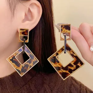 Vintage leopard print rhombus hollow earrings with gold-toned metal frames