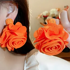 Handmade vibrant orange raffia and chiffon rose flower drop earrings for women