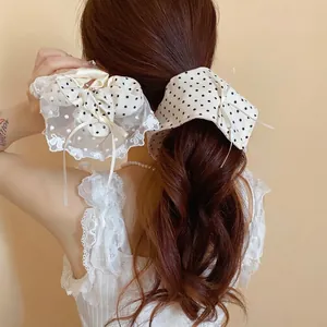 Fermacapelli a pois stile francese con bordo in pizzo per acconciature eleganti