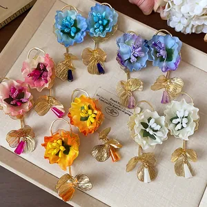 Handmade fabric flower drop earrings in various colors with elegant crystal pendants