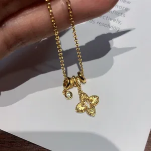 Elegant 18K gold-plated flower pendant necklace with shimmering zircon accents for women