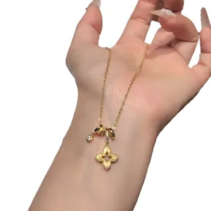 Gold-plated necklace with zircon-encrusted flower pendant for a minimalist luxury look.