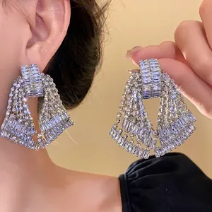 Sparkling silver needle rhinestone tassel earrings with a luxury oversized chandelier design
