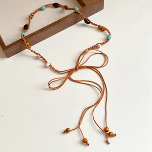Detailed view of bohemian braided beaded waist belt for women vintage ethnic style